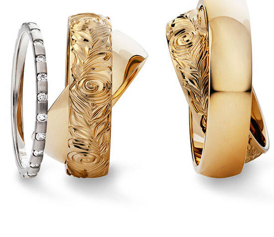 Beispiel: Trauringe - Gold mit Verlobungsring, Foto: Juwelier Stöckle.